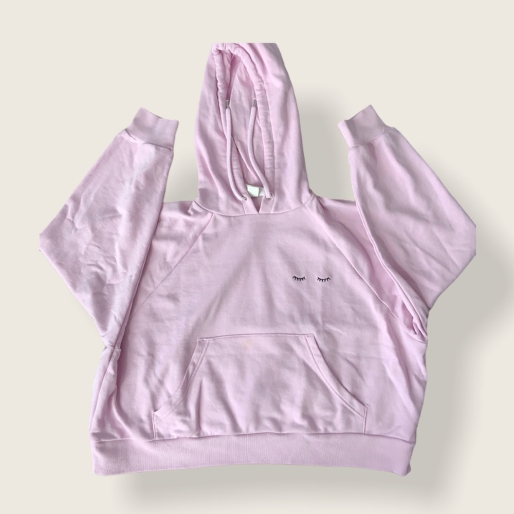 Pink cropped hoodie with eyelashes design